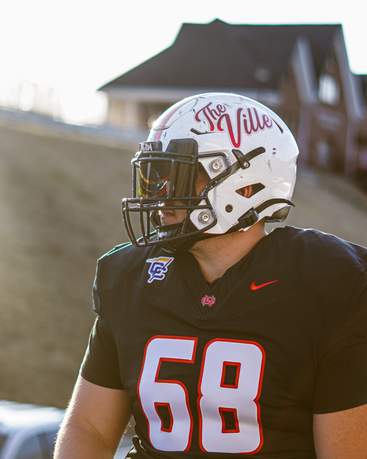 NGU football player action shot by Nate R Media