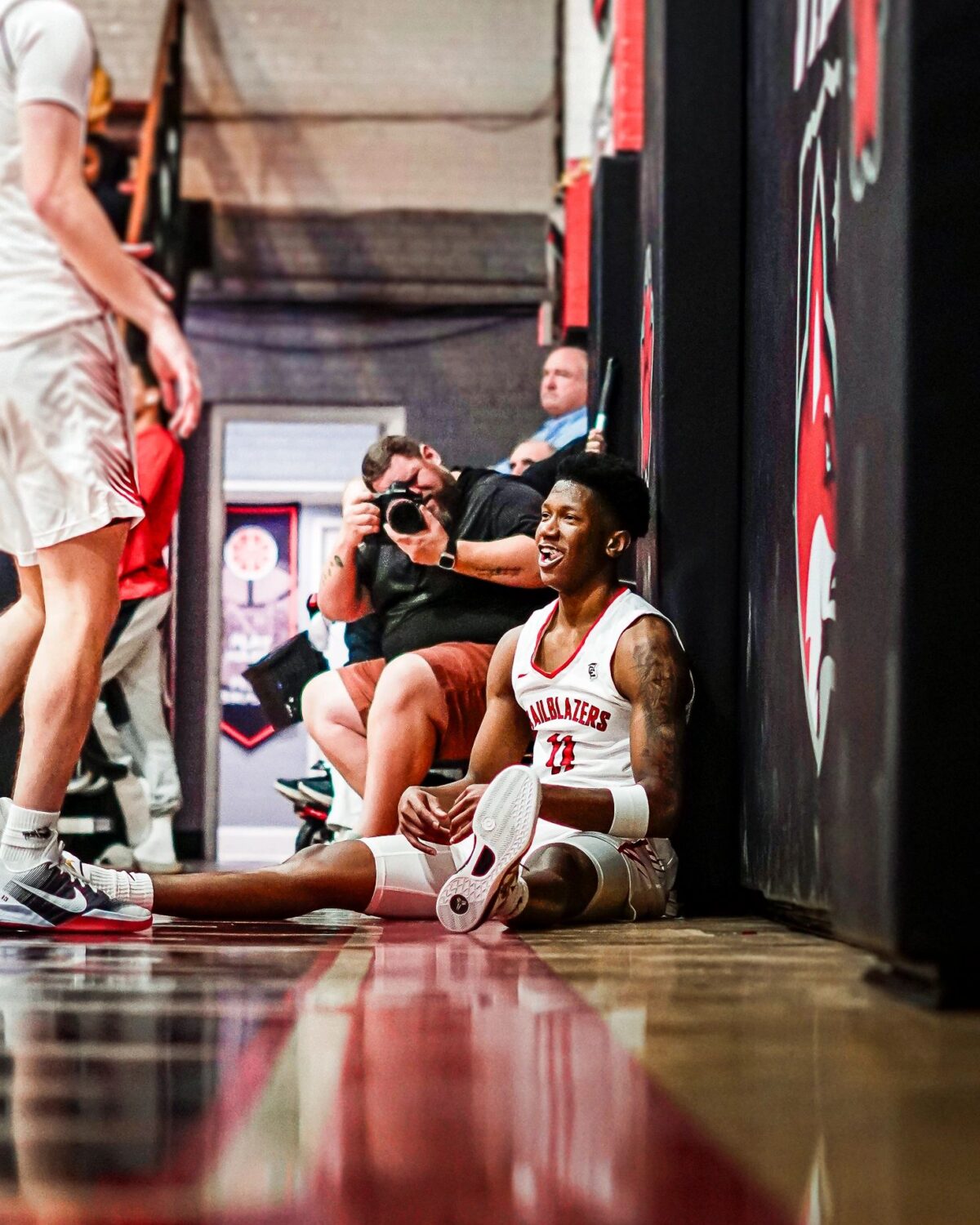 Sideline sports action shot by Nate R Media